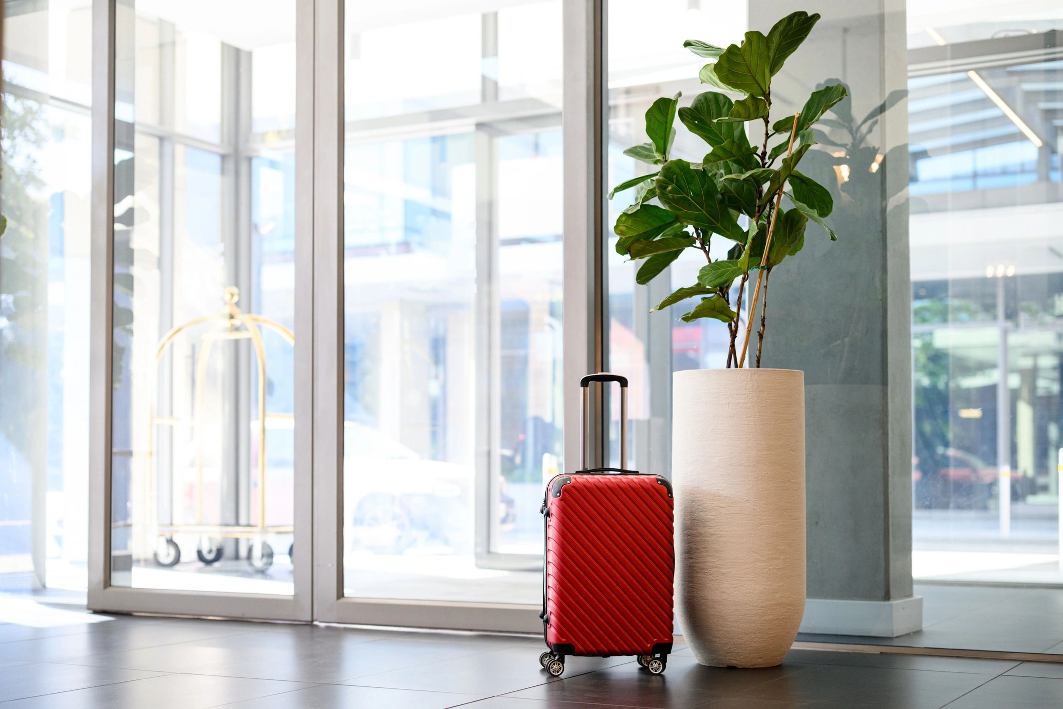 Travel case in hotel setting for customer testimonial
