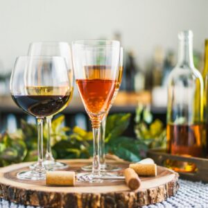 Indoor wine tasting with various bottles of wine and glasses